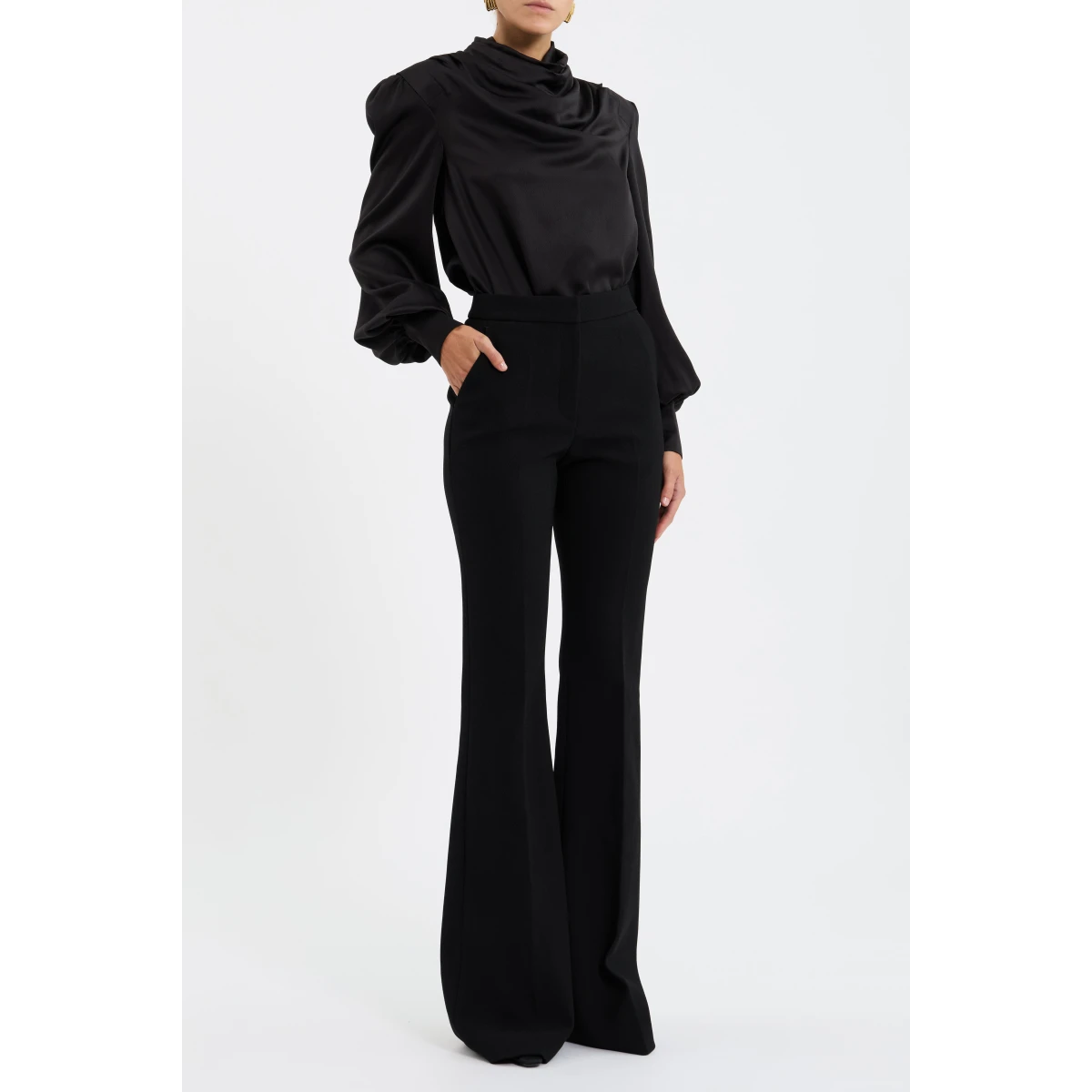 while an invisible zip fastening at the back ensures ease of wear. Effortlessly versatile