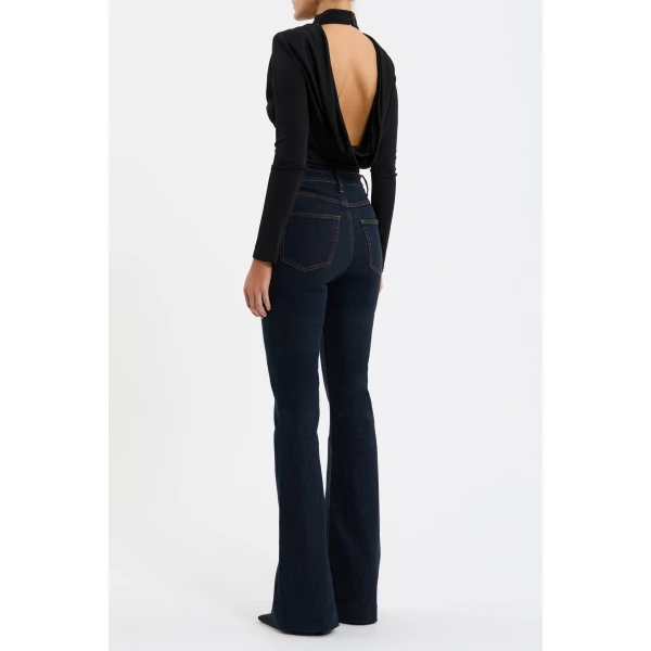 this top pairs effortlessly with your wardrobe essentials.
