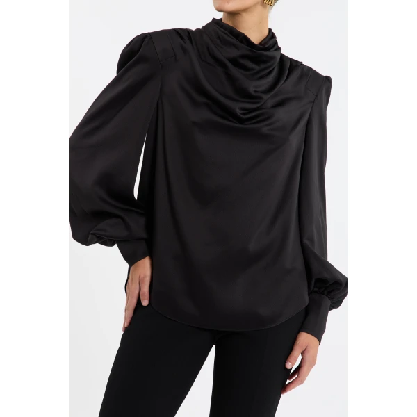 Rebecca Vallance Black Tops The Raven Long Sleeve Top in black is an ideal choice to elevate your styling. It features a high cowl neckline and relaxed-fit silhouette
