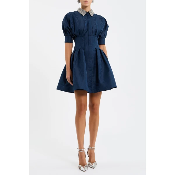 tailored from watermark taffeta. Featuring a sleek collared neckline adorned with diamante embellishments