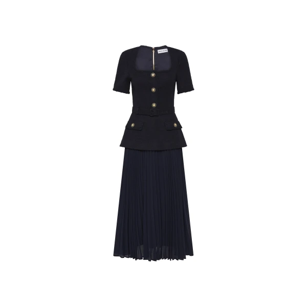 Rebecca Vallance Blue Dresses The Jonie Midi Dress in navy epitomises timeless elegance and class. It features a sophisticated fitted bodice with a scoop neckline and short sleeves