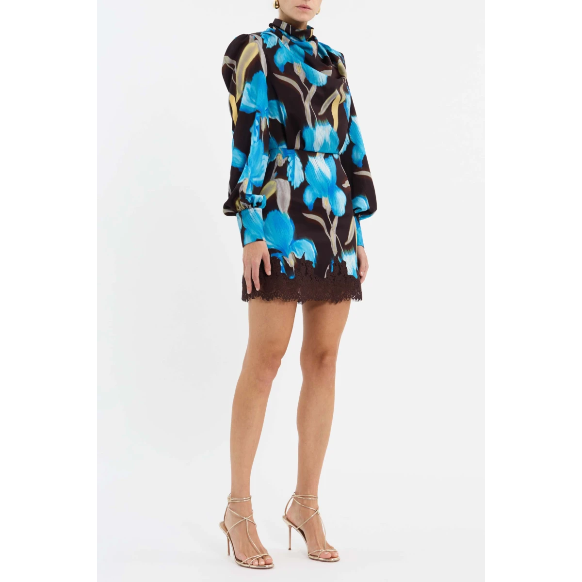 enhanced by sleeve plackets and buttons at the back. The fitted mini skirt is elevated with a lace applique hem