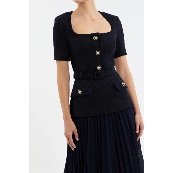 Rebecca Vallance Blue Dresses The Jonie Midi Dress in navy epitomises timeless elegance and class. It features a sophisticated fitted bodice with a scoop neckline and short sleeves