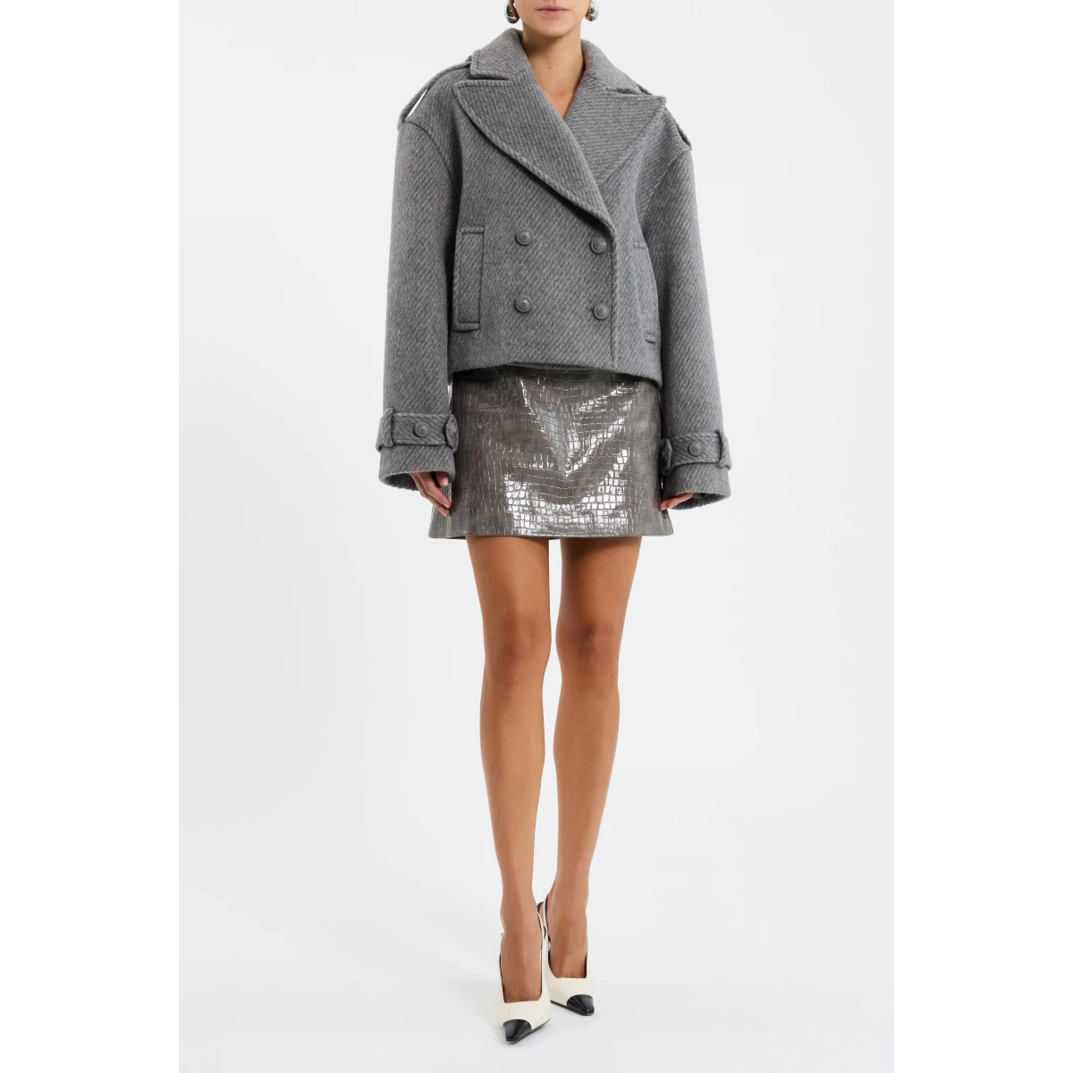 crafted from wool. Featuring a cropped