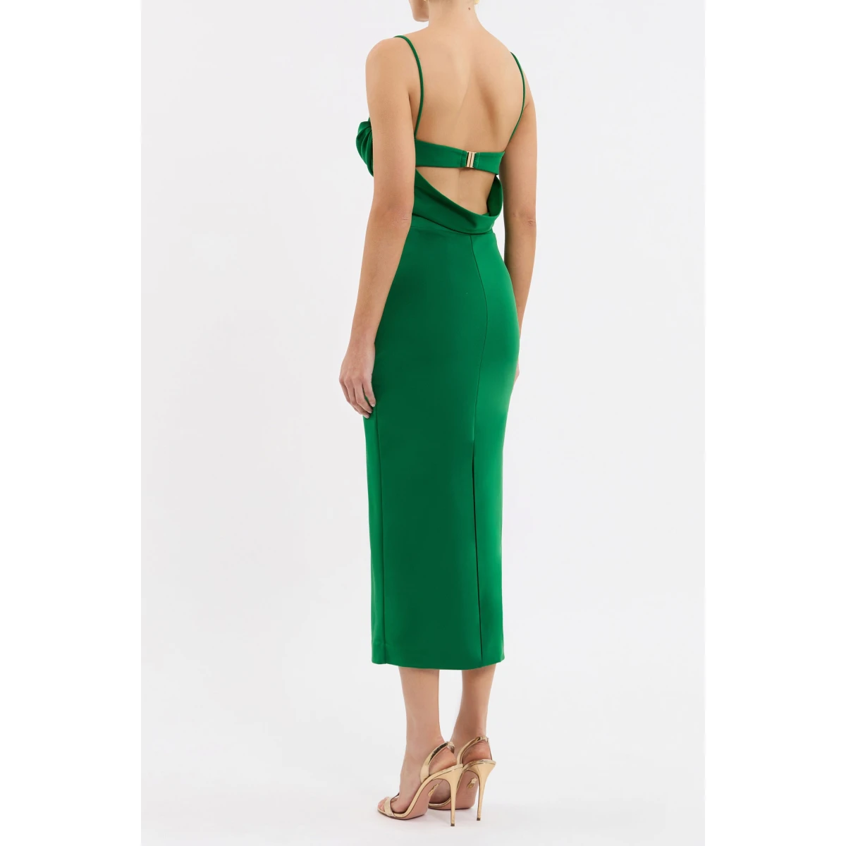 supported by delicate spaghetti straps and adorned with gold ring embellishments for a touch of opulence. An open cowl back adds allure