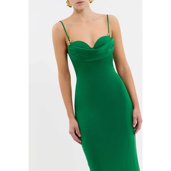 secured with a bra clasp for a precise fit. Complete with a back split for ease of movement and lining for comfort