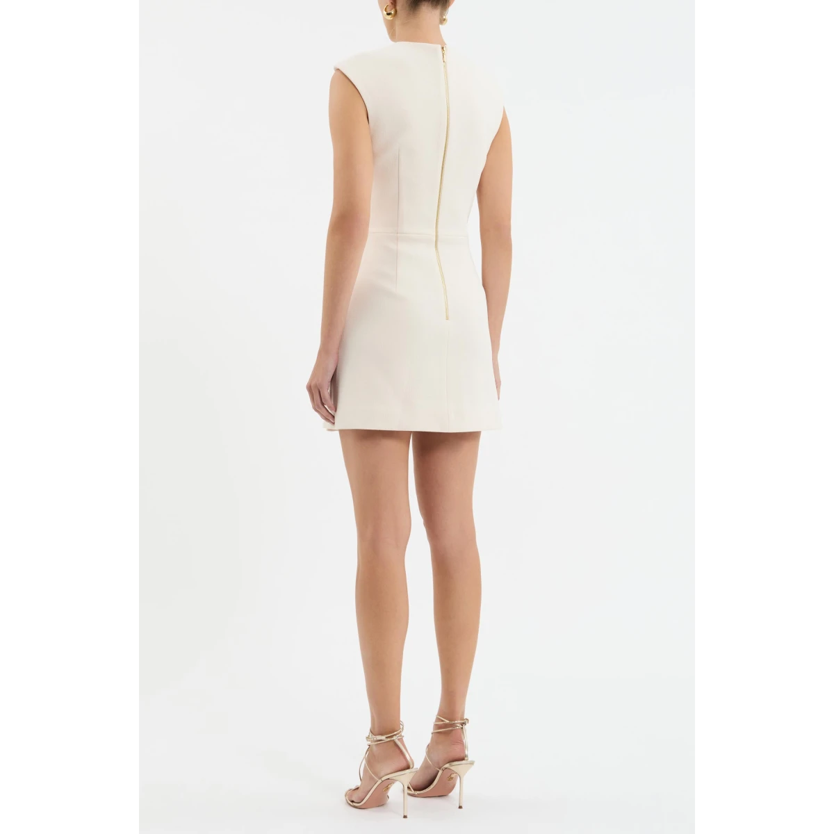 the mini wrap skirt shapes a sophisticated silhouette