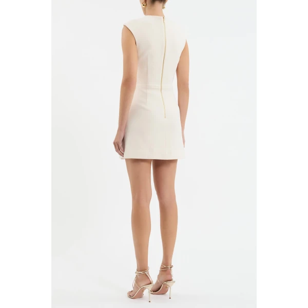 the mini wrap skirt shapes a sophisticated silhouette