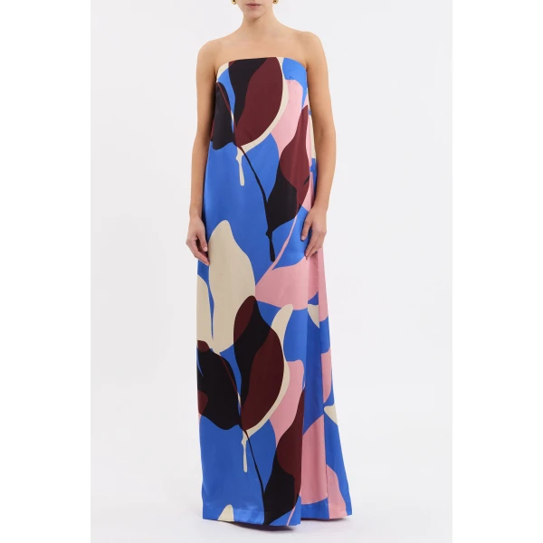 tailored from silk. Highlighting a feminine strapless neckline