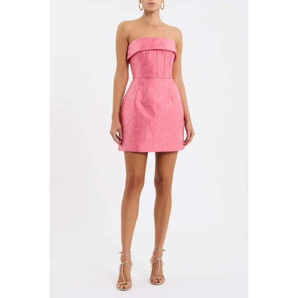 the strapless neckline and corseted bodice shape a feminine silhouette