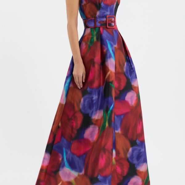 complemented by an open back and neck tie for a touch of allure. Cinched at the waist with a self-belt