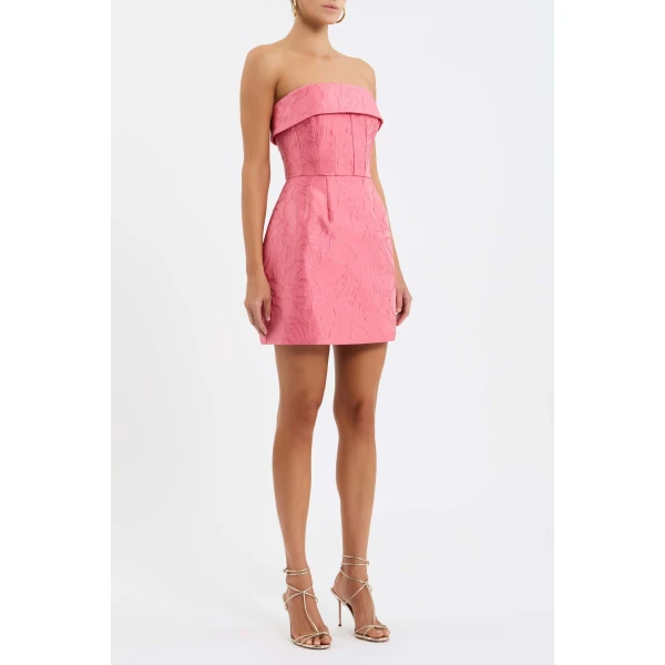 detailed with a bust overlay. A cinched waist defines the figure