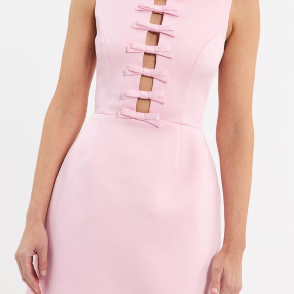 while the sculpted tulip mini skirt offers a flattering fit. Fully lined and complete with an invisible zip fastening at the back