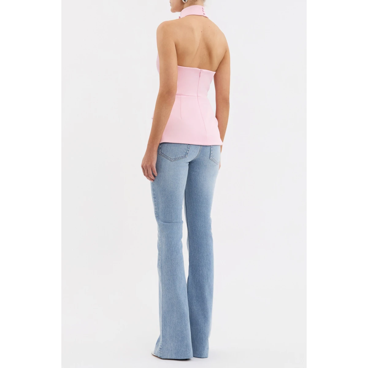 featuring welt pockets and a cinched waist