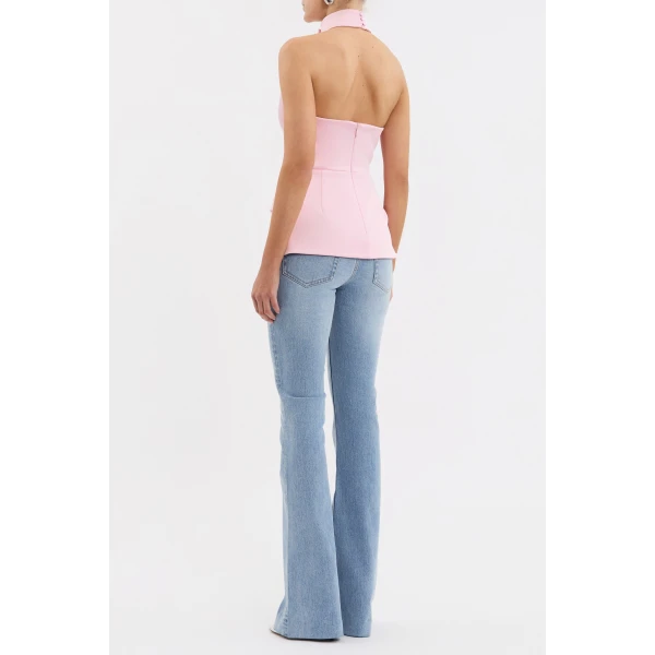 featuring welt pockets and a cinched waist