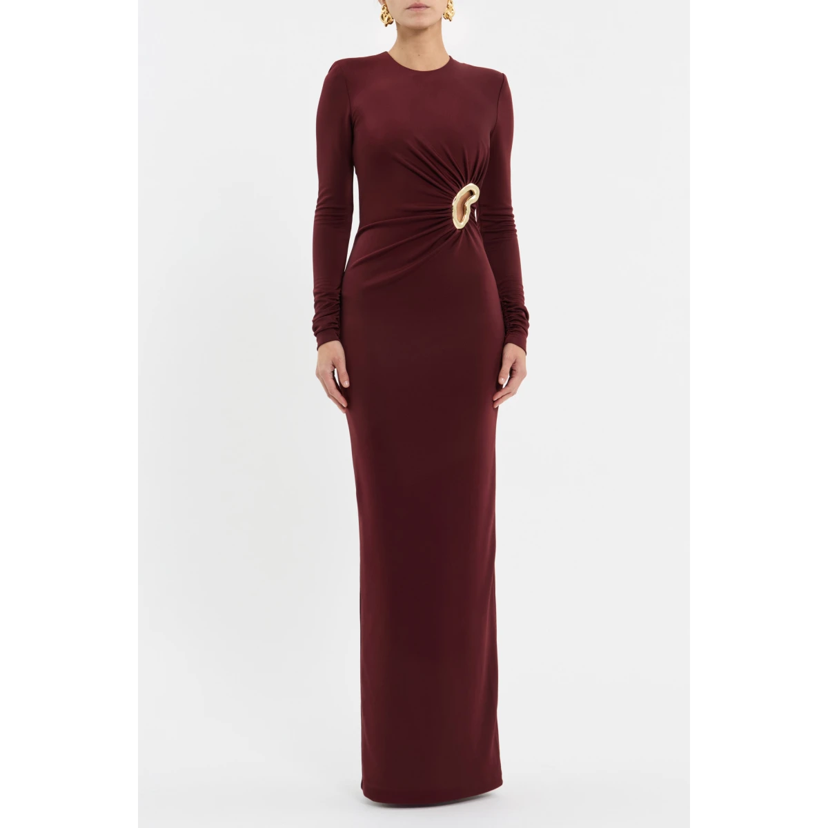 tailored from premium jersey. A rounded neckline and long gathered sleeves complement the body-skimming silhouette