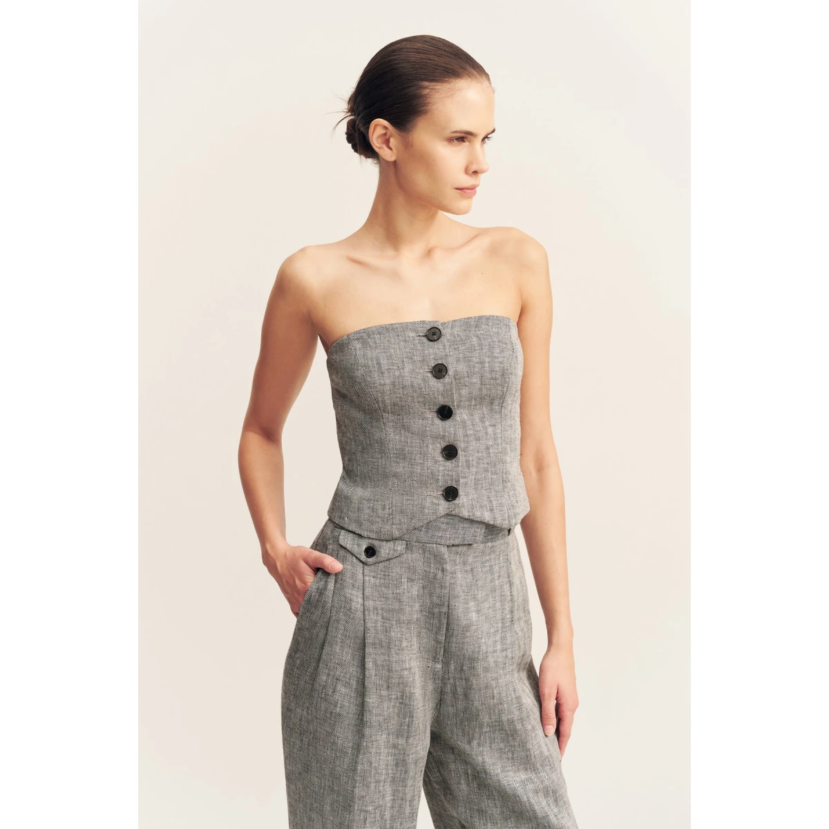 Strapless button up bodice in a herringbone pure linen.