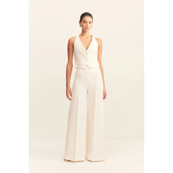 Fitted vest in a textured crepe fabrication.