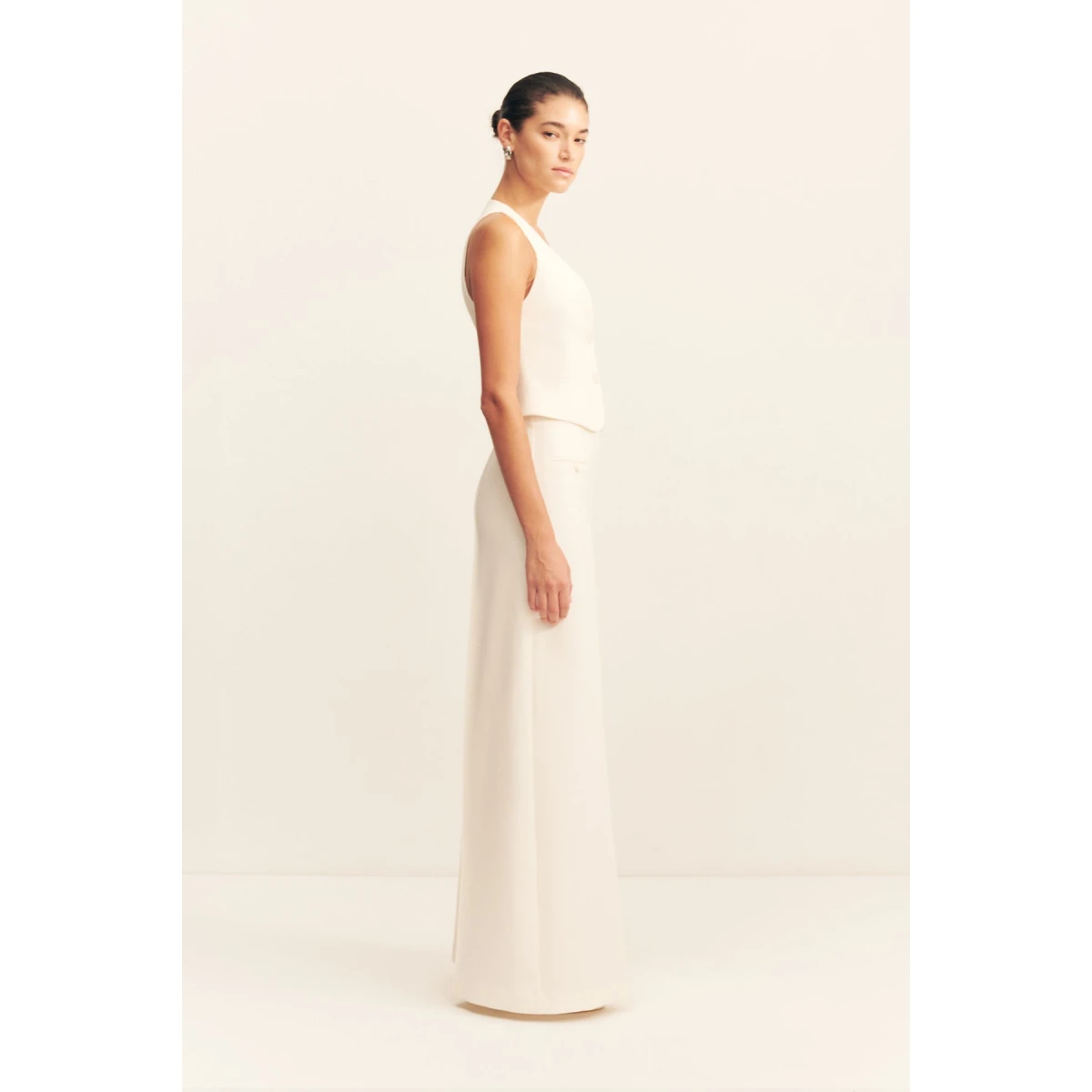 Fitted vest in a textured crepe fabrication.