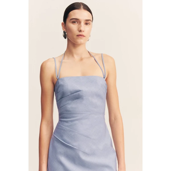 Draped mini dress with tie details in an ocean blue light weight textured suiting.