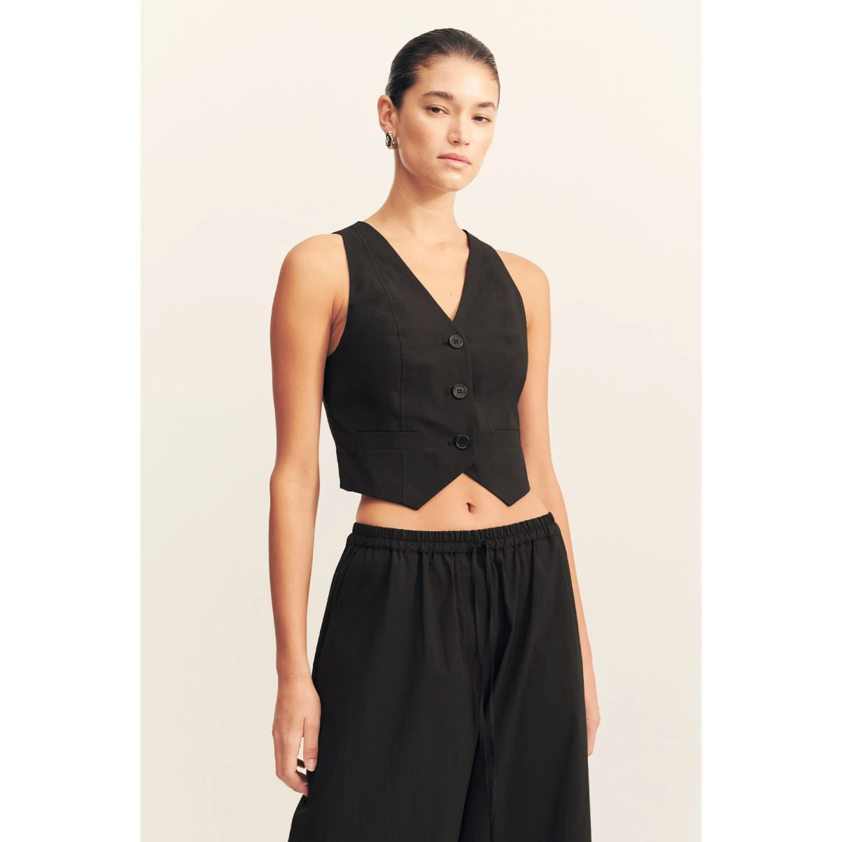 Tailored vest in black in a premium stretch cotton blend.