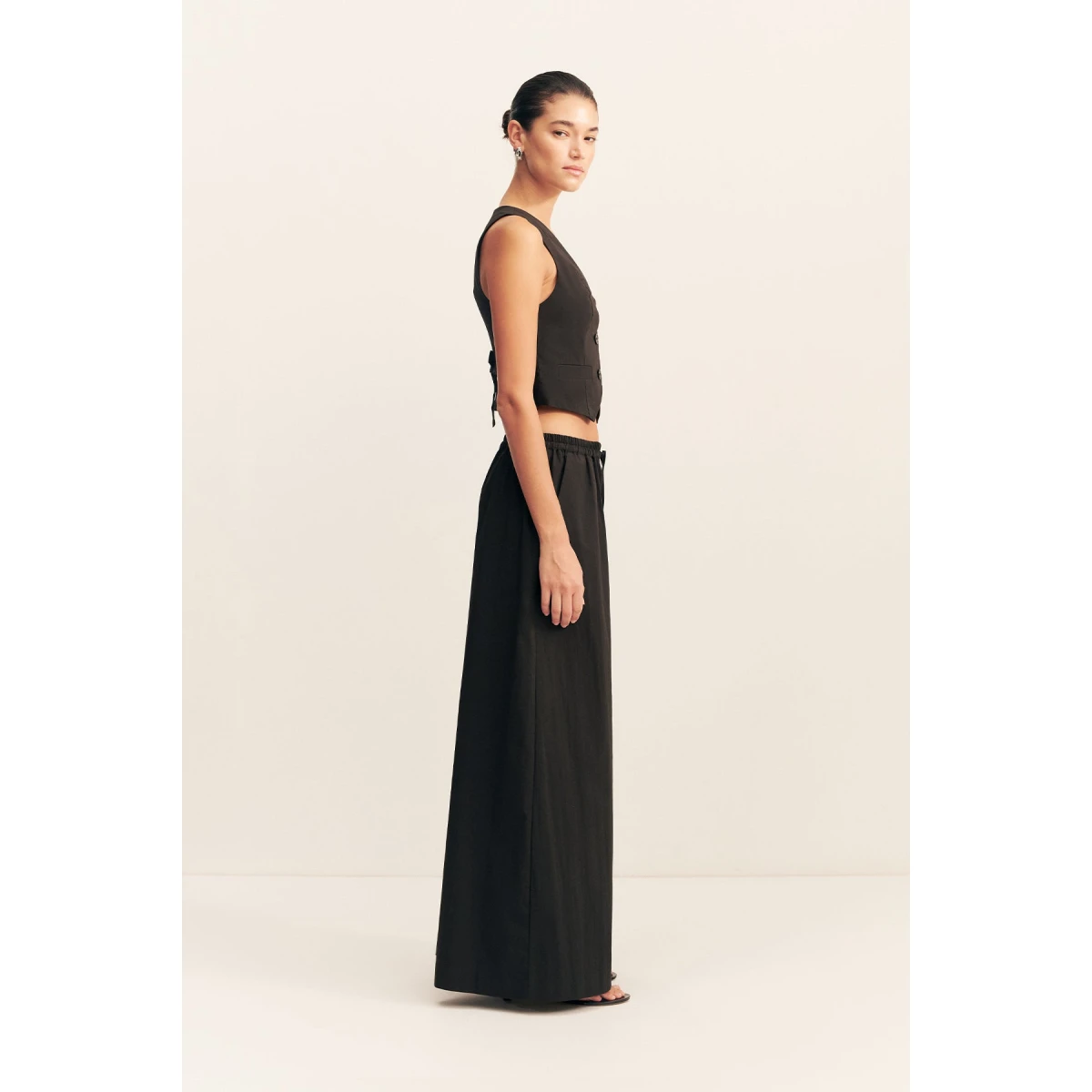 Tailored vest in black in a premium stretch cotton blend.