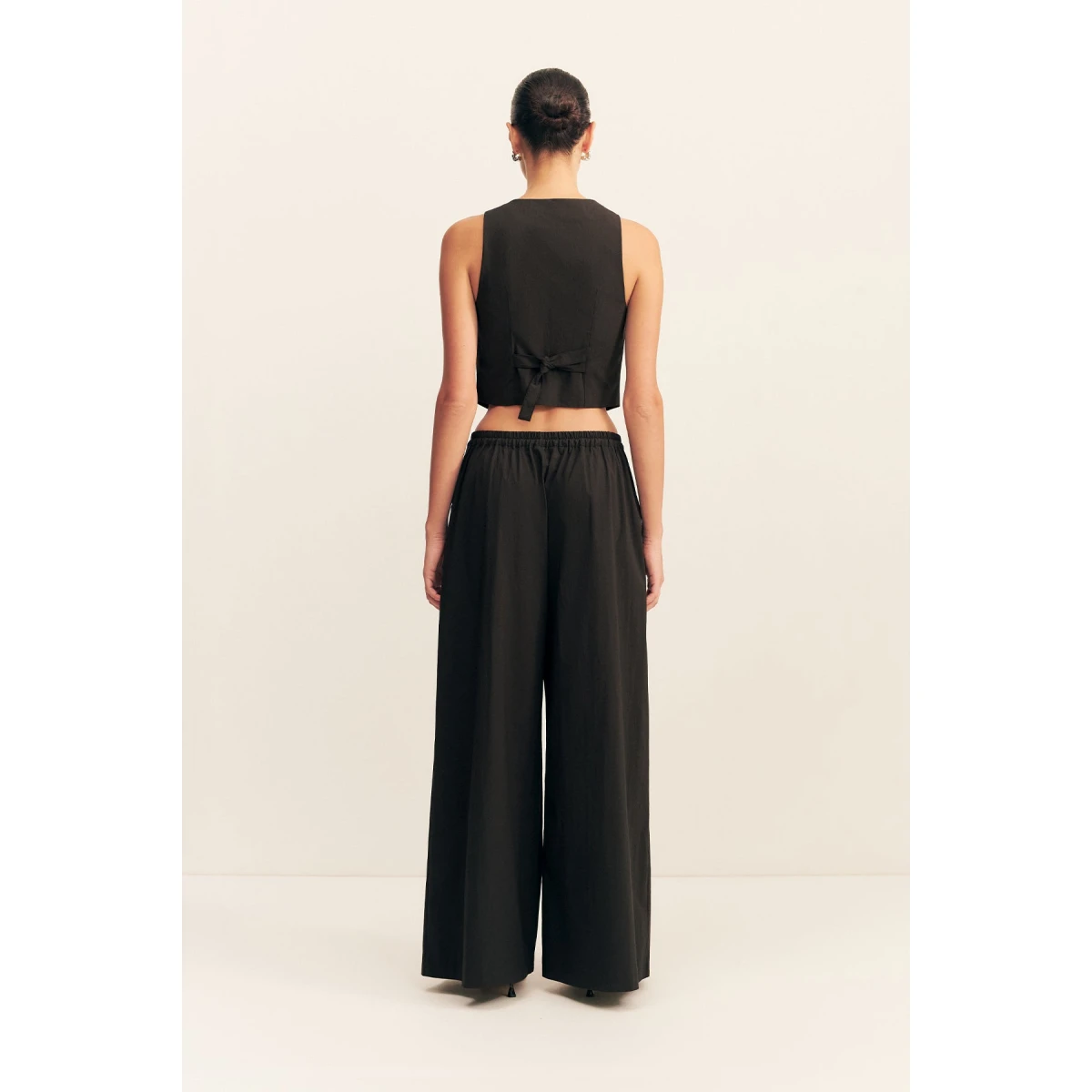 Tailored vest in black in a premium stretch cotton blend.