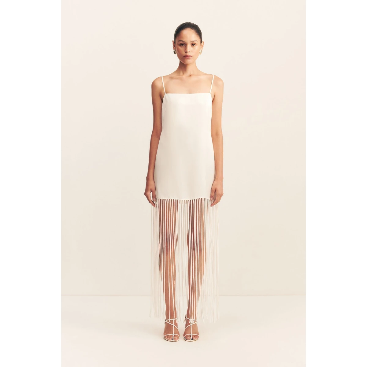 Square neck maxi dress with fringe detail in ivory in a luxurious satin acetate contrasted with a light weight semi-sheer georgette.