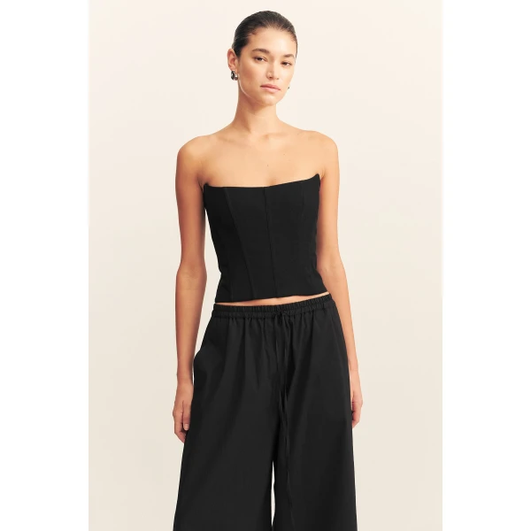 Strapless panelled corset in black in a textured ottoman viscose.