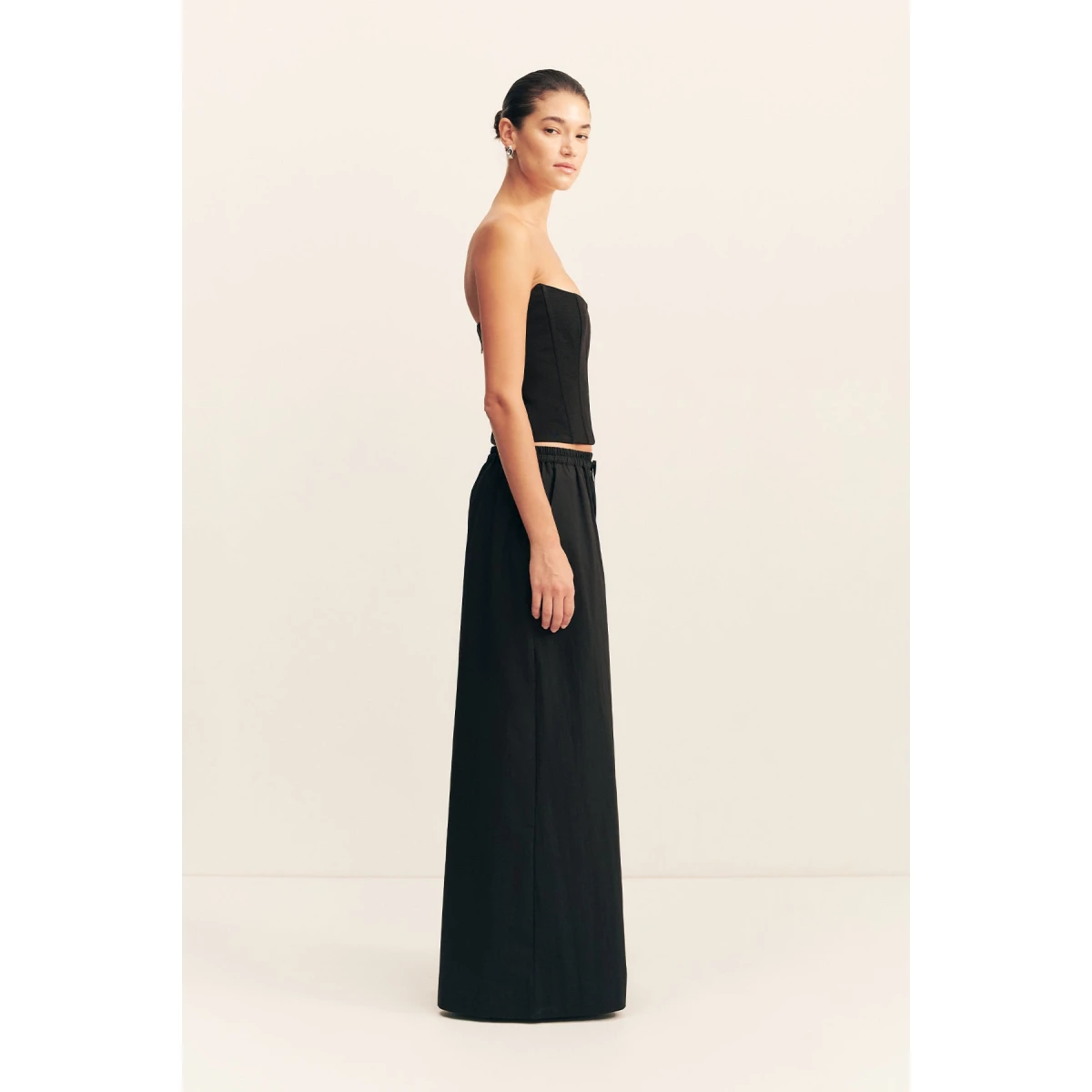 Strapless panelled corset in black in a textured ottoman viscose.