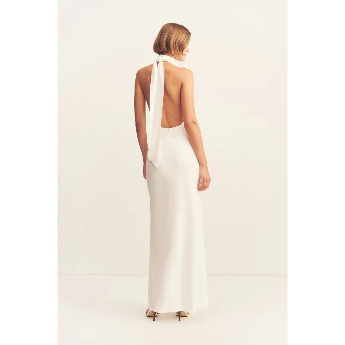 Halter neck maxi dress in ivory in a soft matte satin-back crepe.