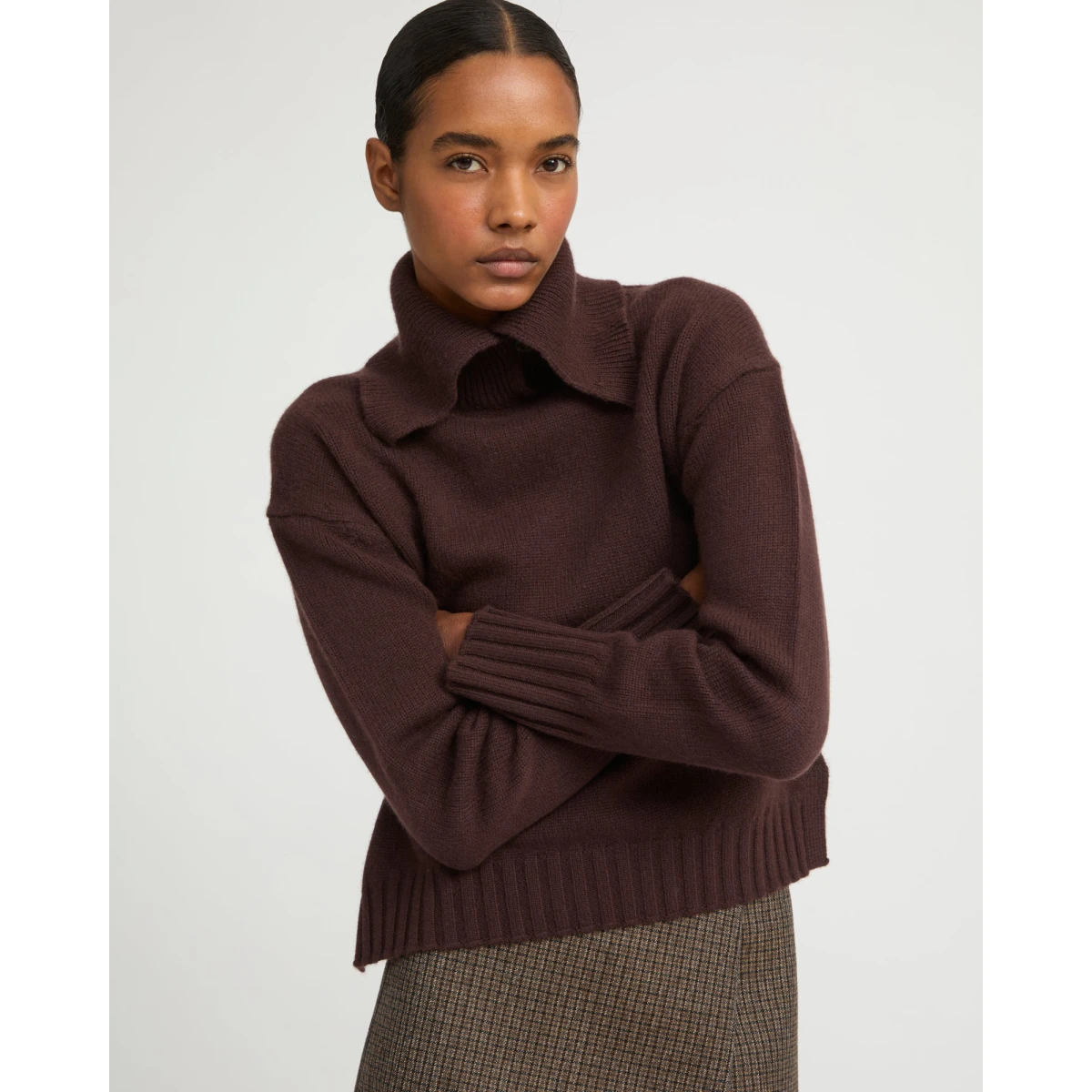 Woman wearing Yves Salomon shearling fur coat – luxury outerwear at Coveti