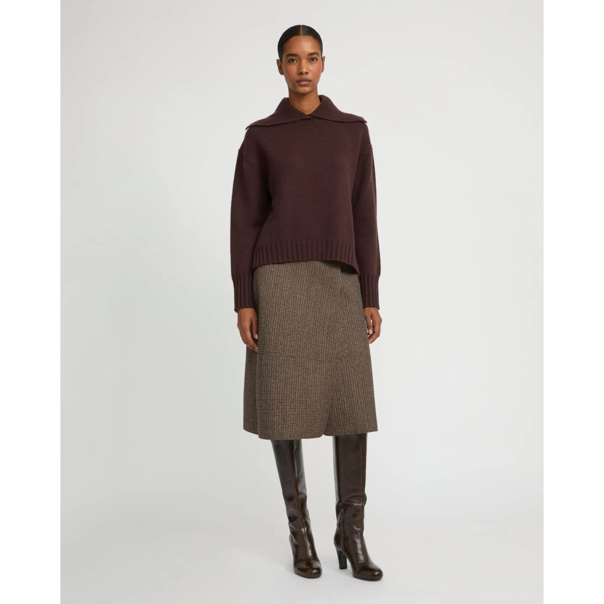 Woman wearing Yves Salomon shearling fur coat – luxury outerwear at Coveti