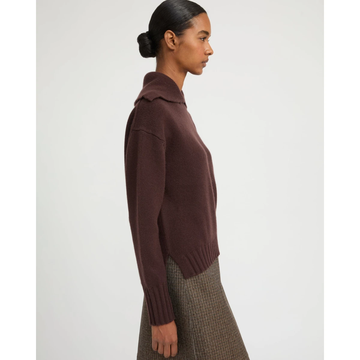 Woman wearing Yves Salomon shearling fur coat – luxury outerwear at Coveti