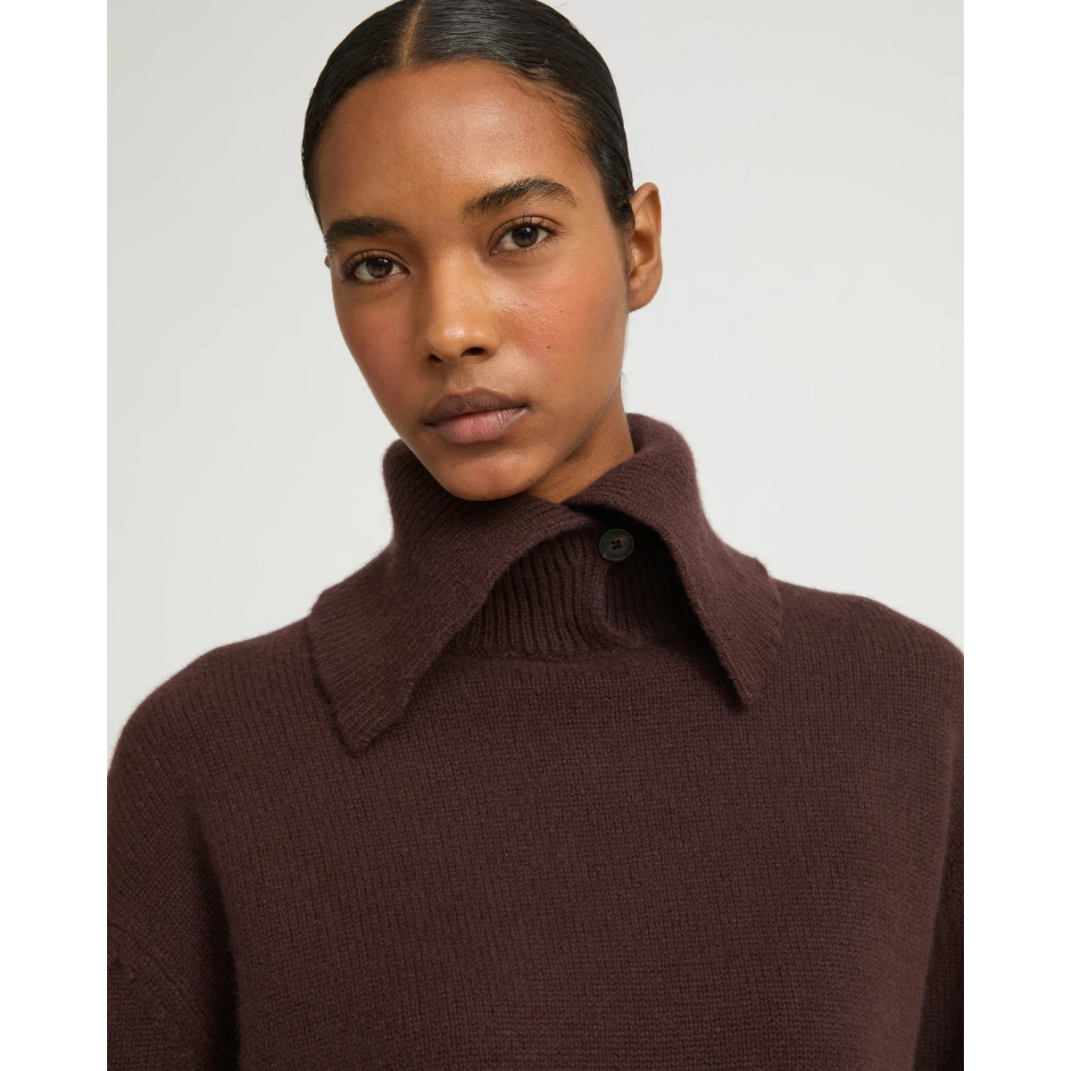 Woman wearing Yves Salomon shearling fur coat – luxury outerwear at Coveti