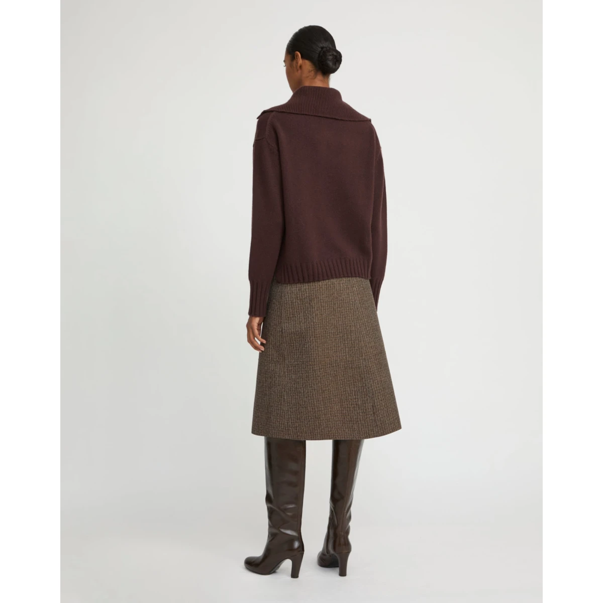 Woman wearing Yves Salomon shearling fur coat – luxury outerwear at Coveti