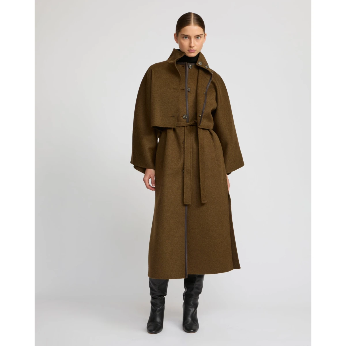 Woman wearing Yves Salomon shearling fur coat – luxury outerwear at Coveti