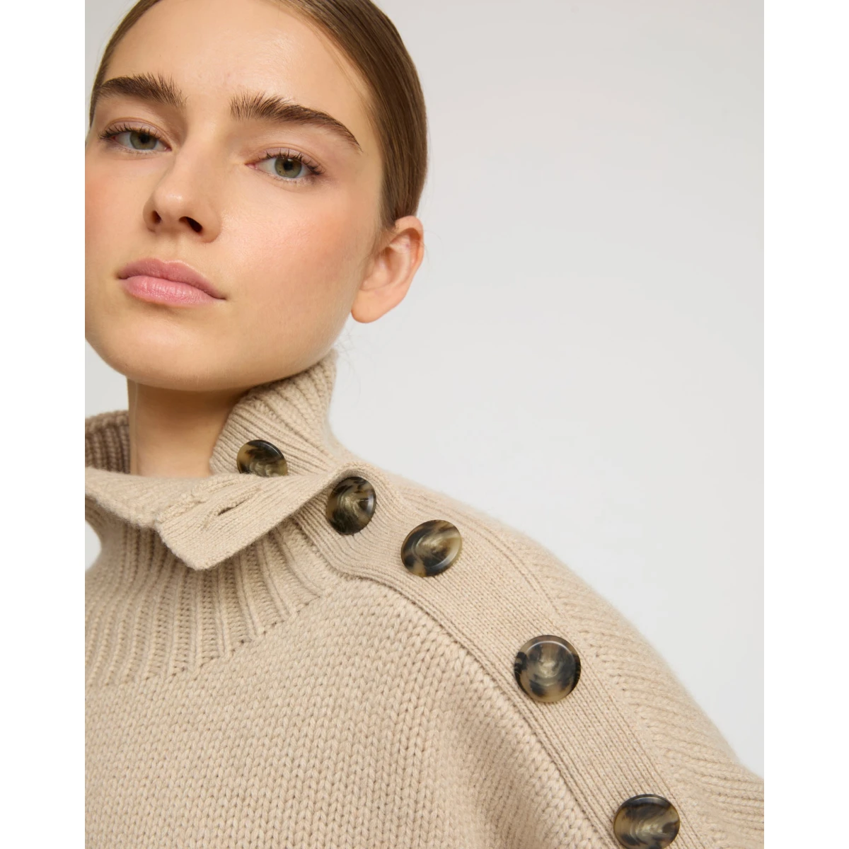Woman wearing Yves Salomon shearling fur coat – luxury outerwear at Coveti