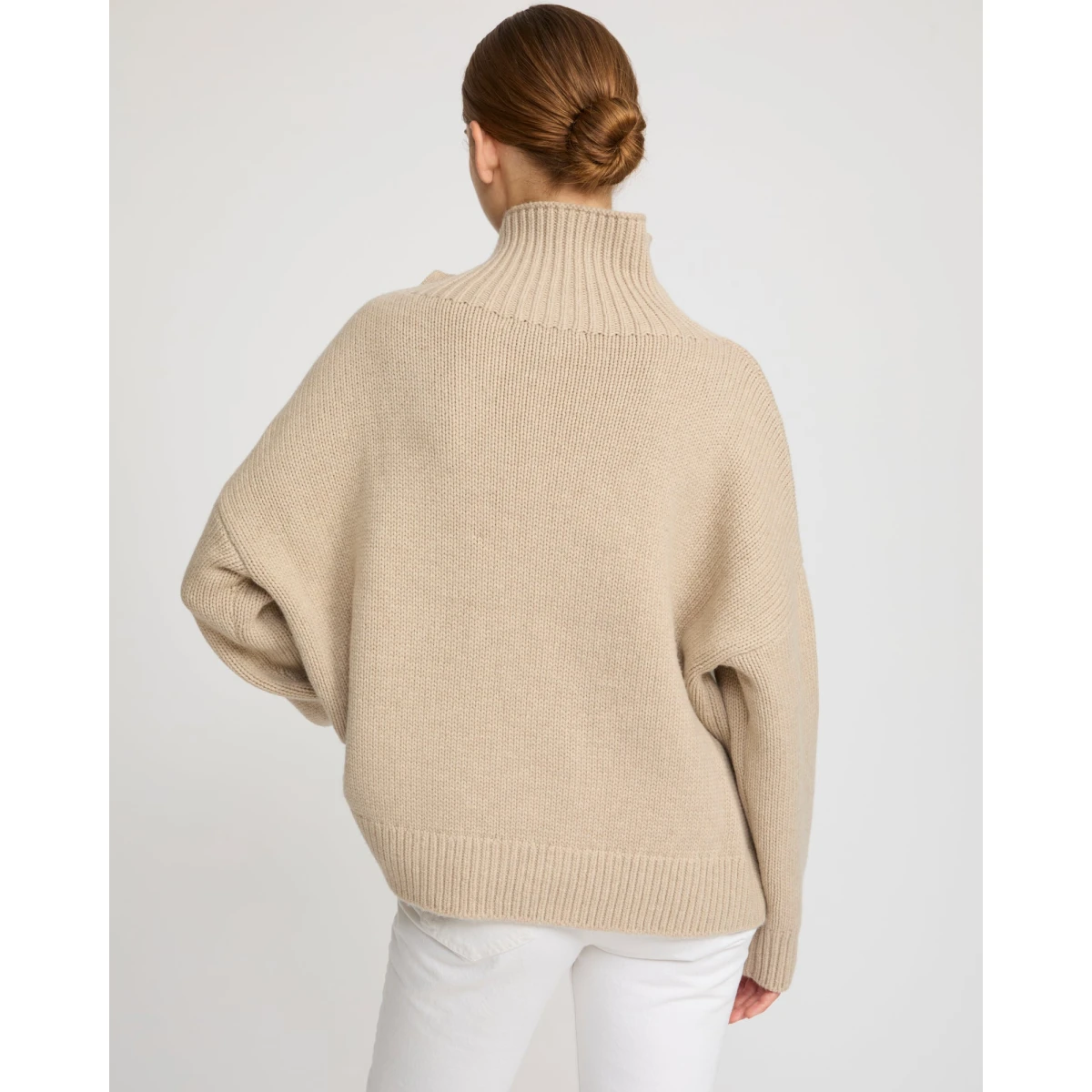 Woman wearing Yves Salomon shearling fur coat – luxury outerwear at Coveti
