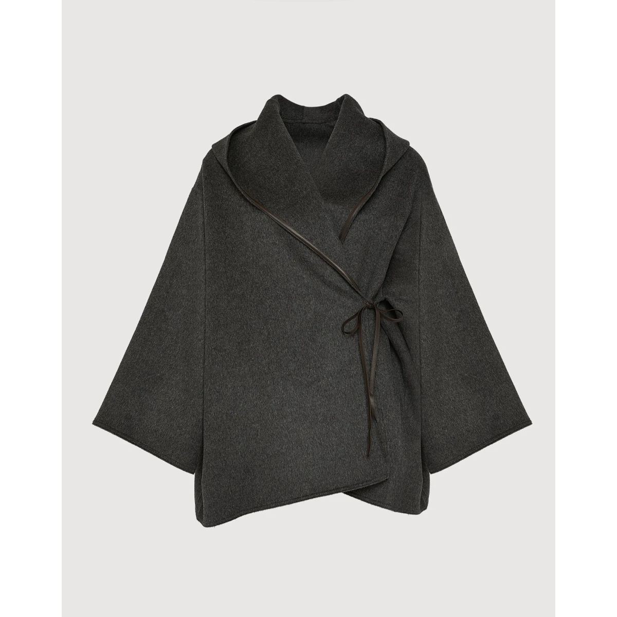 Woman wearing Yves Salomon shearling fur coat – luxury outerwear at Coveti