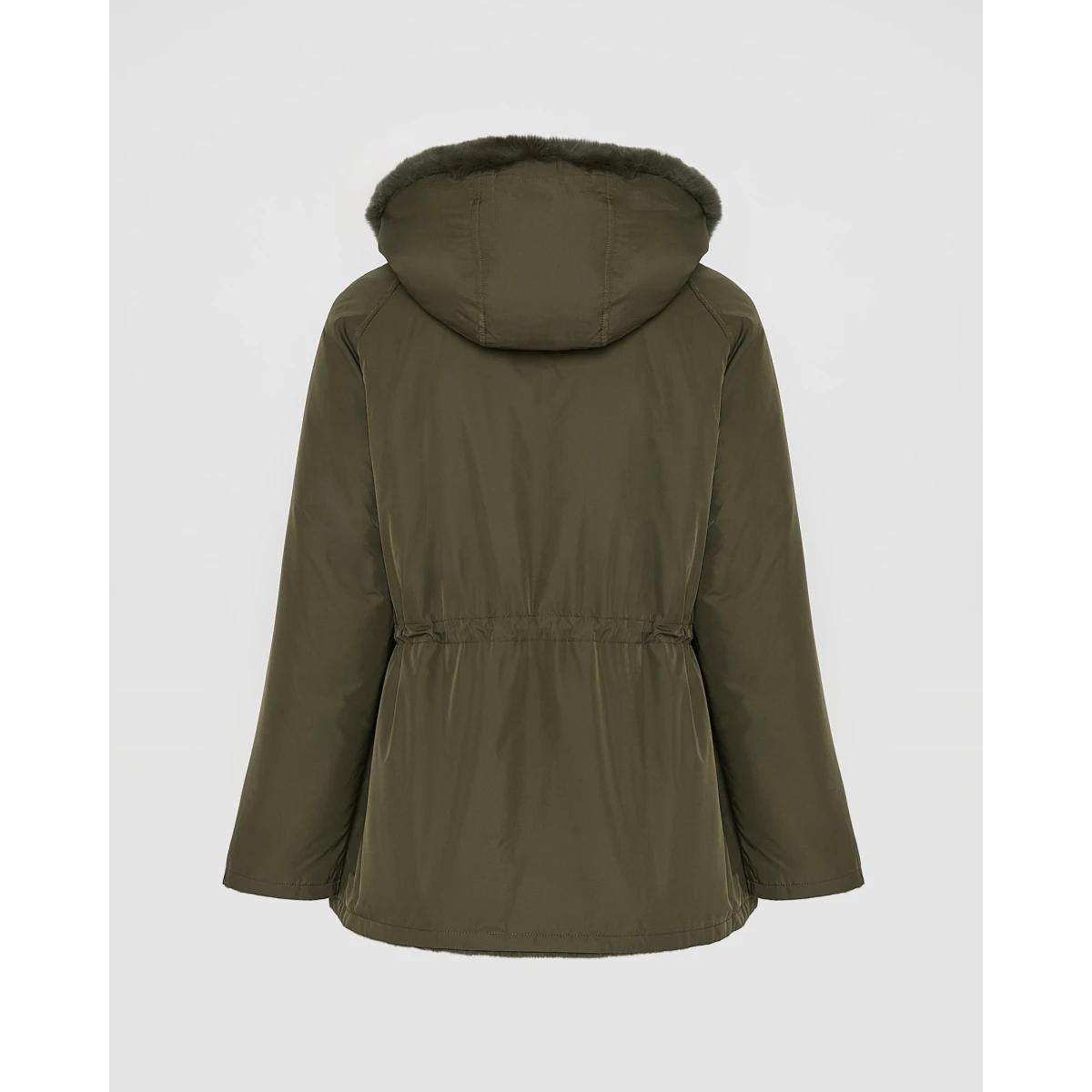 Woman wearing Yves Salomon shearling fur coat – luxury outerwear at Coveti