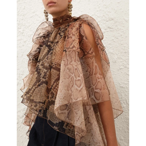 Elevate your elegance in this Zimmermann Tops   from the 2025 resort wear edit