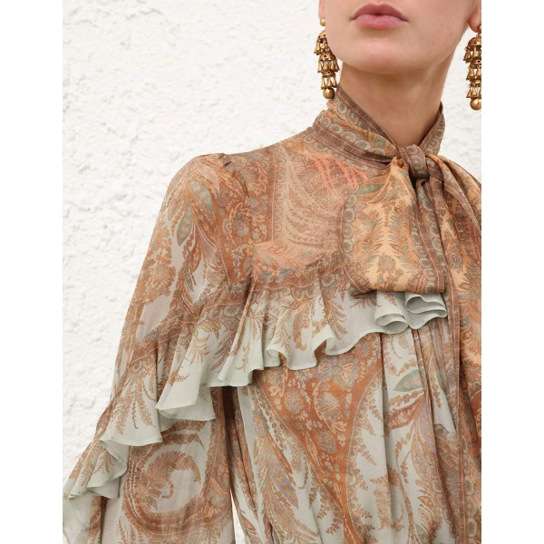 Elevate your elegance in this Zimmermann Tops   from the 2025 resort wear edit