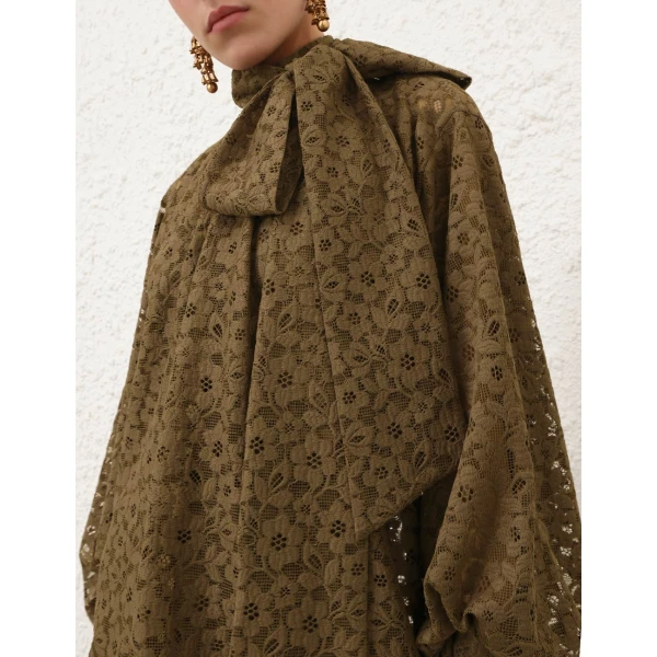 Elevate your elegance in this Zimmermann Tops   from the 2025 resort wear edit