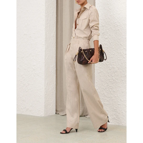 Elevate your elegance in this Zimmermann Tops   from the 2025 resort wear edit