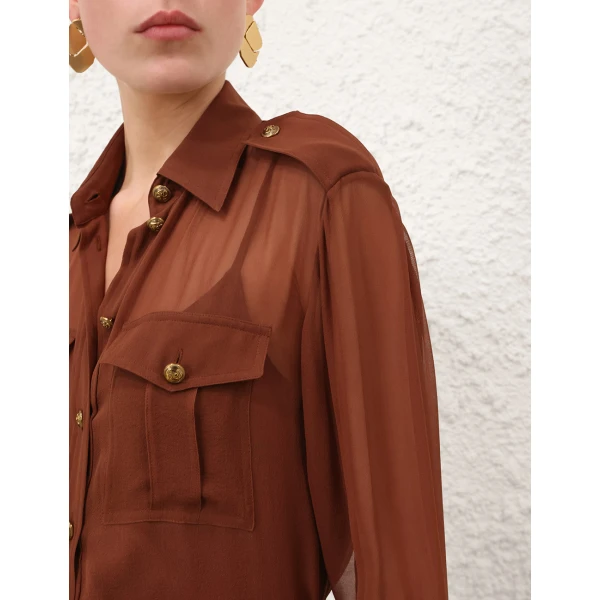 Elevate your elegance in this Zimmermann Tops   from the 2025 resort wear edit