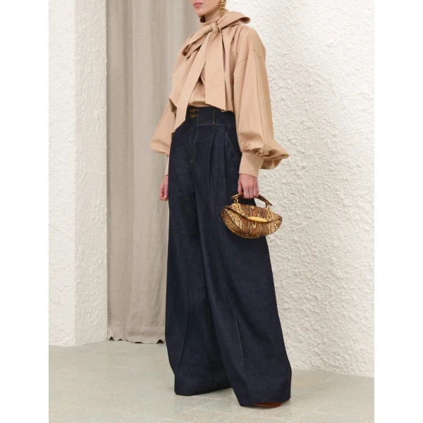 Elevate your elegance in this Zimmermann Tops   from the 2025 resort wear edit