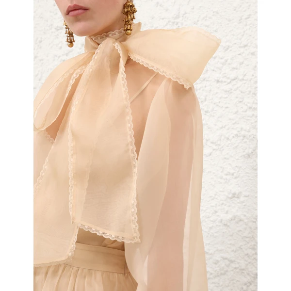 Elevate your elegance in this Zimmermann Tops   from the 2025 resort wear edit