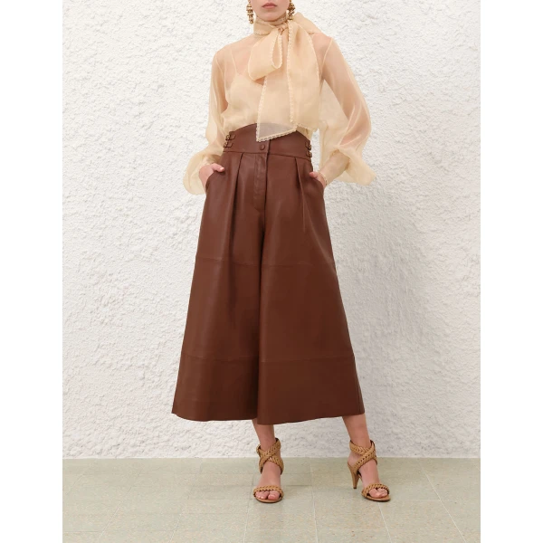 Elevate your elegance in this Zimmermann Tops   from the 2025 resort wear edit