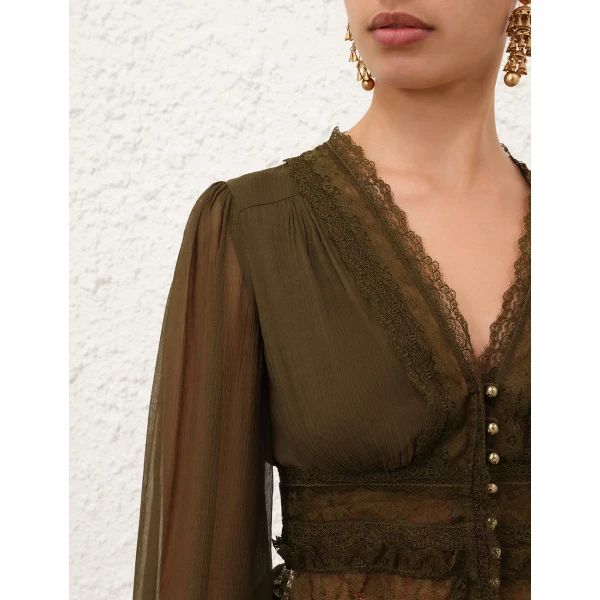 Elevate your elegance in this Zimmermann Tops   from the 2025 resort wear edit